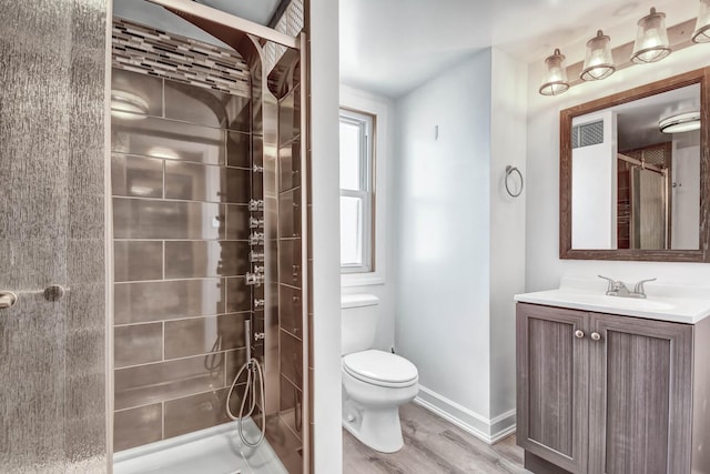 11549 S Kilbourn Ave, Alsip, IL 60803 - full bathroom with a shower stall, vanity, toilet, wood finished floors, and baseboards