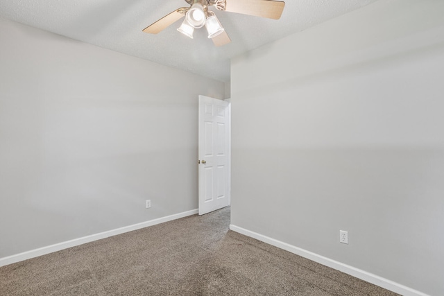 2409 Valkar Ln, Champaign, IL 61822 - carpeted empty room featuring ceiling fan and baseboards