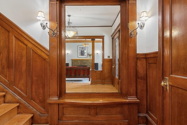 interior space with a wainscoted wall