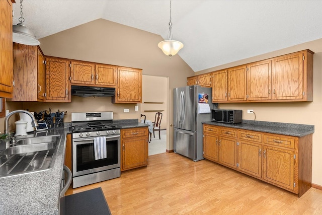 15306 S Heritage Dr, Plainfield, IL 60544 - kitchen with light wood-type flooring, under cabinet range hood, a sink, stainless steel appliances, and brown cabinets