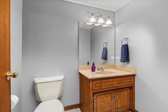 15306 S Heritage Dr, Plainfield, IL 60544 - half bathroom featuring toilet, vanity, and a textured ceiling