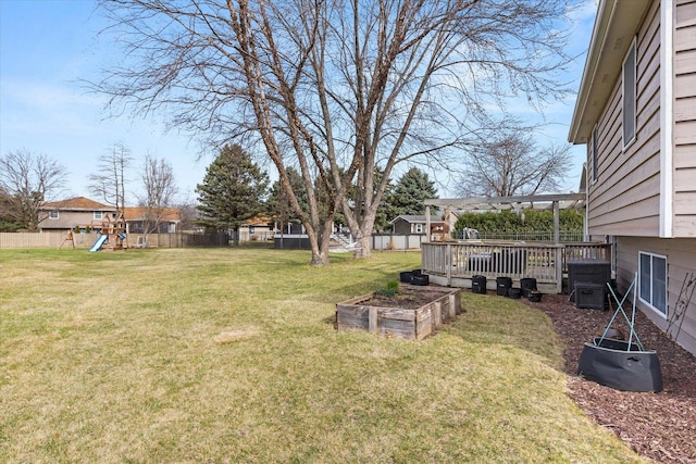 15306 S Heritage Dr, Plainfield, IL 60544 - view of yard featuring a fenced backyard, a vegetable garden, a playground, and a pergola