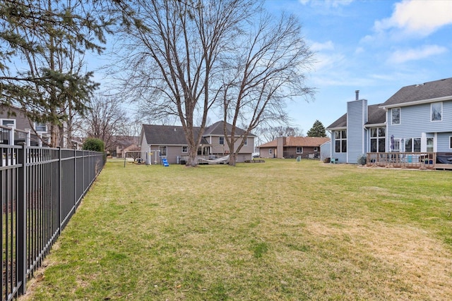 15306 S Heritage Dr, Plainfield, IL 60544 - view of yard featuring a residential view, a fenced backyard, and a wooden deck