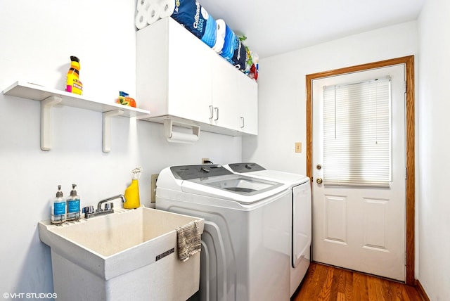 681 Vanderbilt Dr, New Lenox, IL 60451 - laundry room featuring a sink, cabinet space, wood finished floors, and washing machine and clothes dryer
