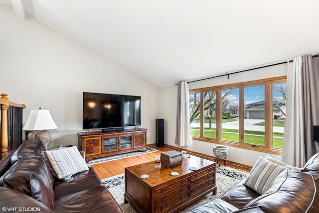 681 Vanderbilt Dr, New Lenox, IL 60451 - living area featuring lofted ceiling with beams and wood finished floors