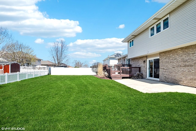 681 Vanderbilt Dr, New Lenox, IL 60451 - view of yard featuring a deck, a fenced backyard, and a patio area