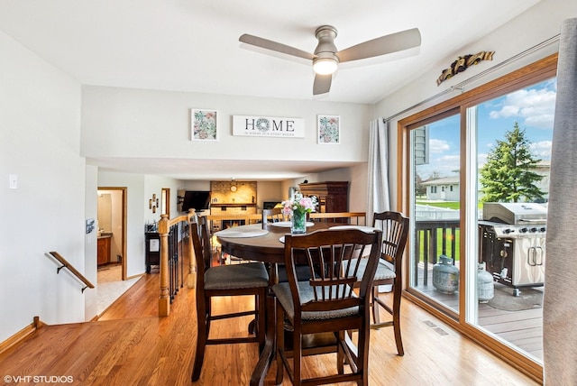 681 Vanderbilt Dr, New Lenox, IL 60451 - dining area featuring light wood-style floors, ceiling fan, and visible vents