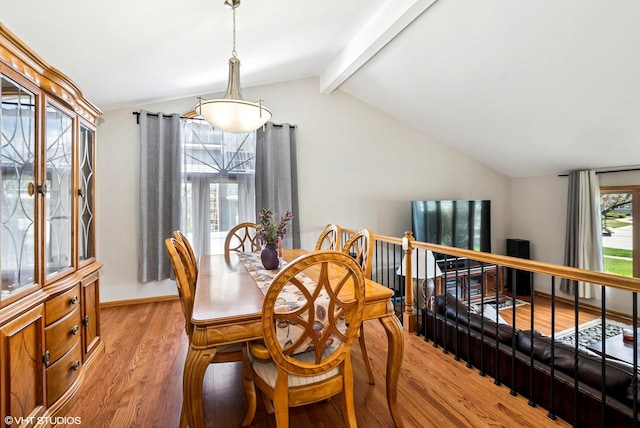 681 Vanderbilt Dr, New Lenox, IL 60451 - dining room featuring lofted ceiling with beams and light wood-type flooring