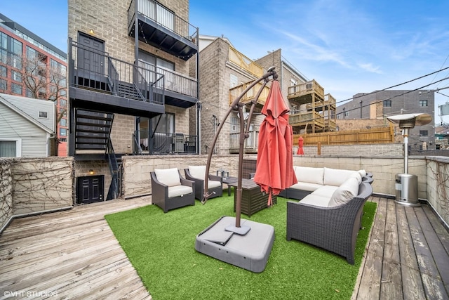 view of yard with a deck and an outdoor hangout area