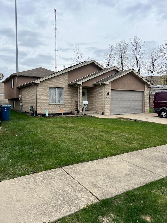 14927 S Blaine Ave, Posen, IL 60469 - single story home with concrete driveway, a front yard, brick siding, and an attached garage