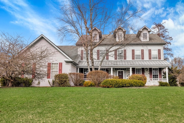 1581 Hunting Hound Ln, Bartlett, IL 60103 - view of front of house with a front yard, roof with shingles, and covered porch