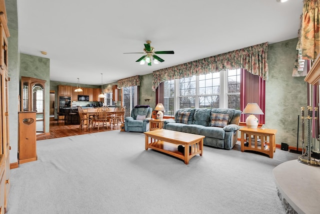 1581 Hunting Hound Ln, Bartlett, IL 60103 - living room featuring light colored carpet and ceiling fan