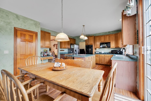 1581 Hunting Hound Ln, Bartlett, IL 60103 - dining space featuring light wood-type flooring