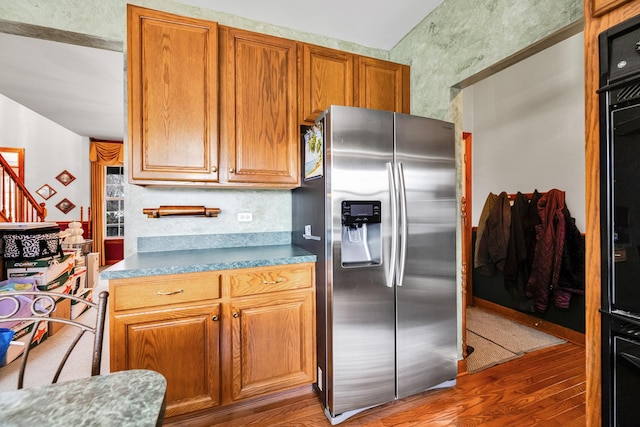 1581 Hunting Hound Ln, Bartlett, IL 60103 - kitchen featuring brown cabinets, stainless steel fridge, and wood finished floors