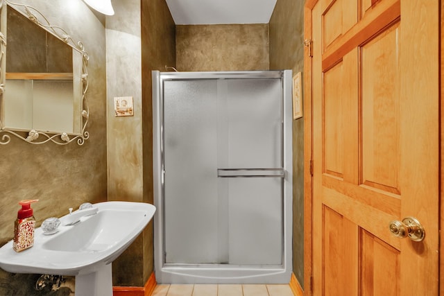 1581 Hunting Hound Ln, Bartlett, IL 60103 - full bath with a shower stall, tile patterned flooring, and a sink