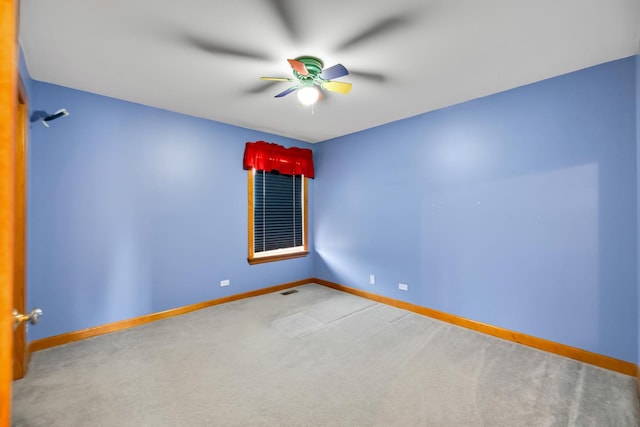 1581 Hunting Hound Ln, Bartlett, IL 60103 - carpeted spare room with visible vents, baseboards, and a ceiling fan