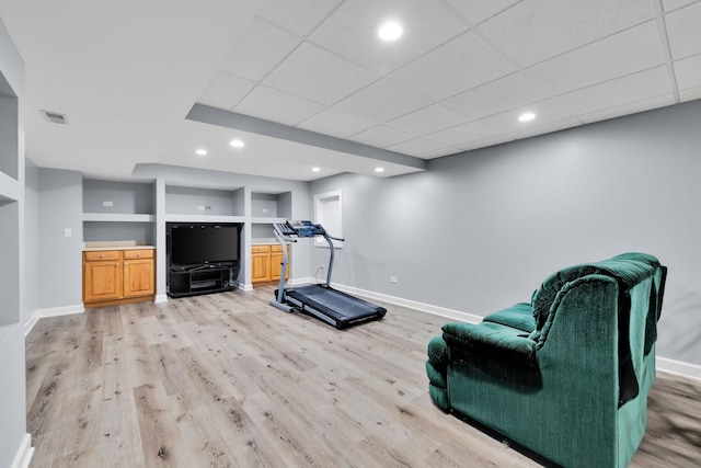 1581 Hunting Hound Ln, Bartlett, IL 60103 - exercise room with light wood-style flooring, recessed lighting, baseboards, and built in shelves