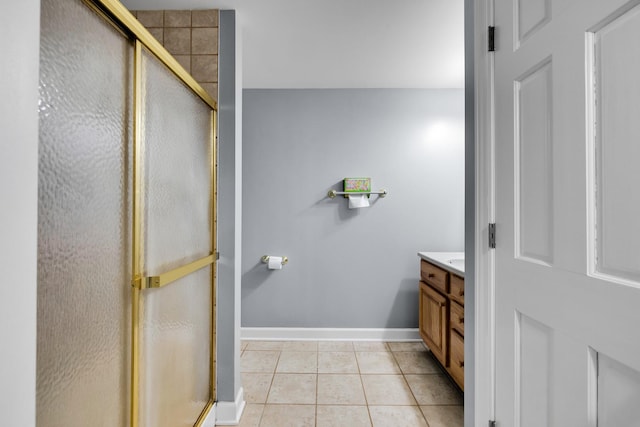 1581 Hunting Hound Ln, Bartlett, IL 60103 - full bathroom featuring a shower stall, tile patterned floors, vanity, and baseboards