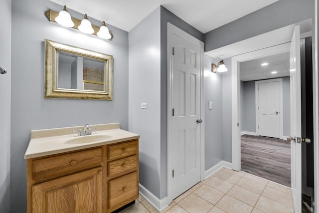 1581 Hunting Hound Ln, Bartlett, IL 60103 - bathroom with baseboards, recessed lighting, tile patterned flooring, and vanity