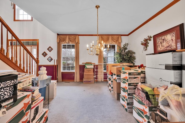 1581 Hunting Hound Ln, Bartlett, IL 60103 - carpeted dining area featuring crown molding, stairway, and a chandelier