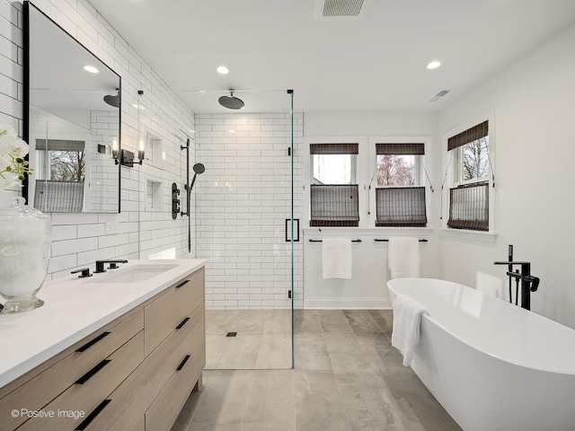4716 Wallbank Ave, Downers Grove, IL 60515 - bathroom featuring vanity, a soaking tub, recessed lighting, a shower stall, and visible vents