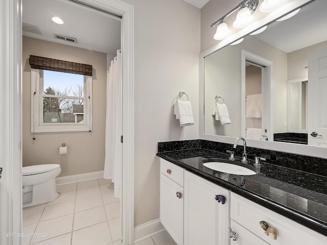 4716 Wallbank Ave, Downers Grove, IL 60515 - full bath with tile patterned flooring, visible vents, baseboards, and toilet