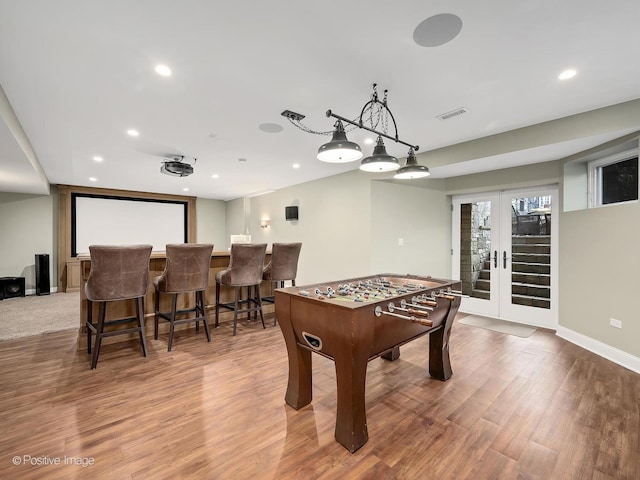 4716 Wallbank Ave, Downers Grove, IL 60515 - game room with baseboards, recessed lighting, french doors, visible vents, and wood finished floors