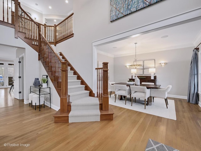 4716 Wallbank Ave, Downers Grove, IL 60515 - stairs featuring crown molding, wood finished floors, and baseboards