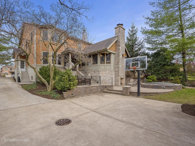 4716 Wallbank Ave, Downers Grove, IL 60515 - view of side of home with stone siding and a chimney