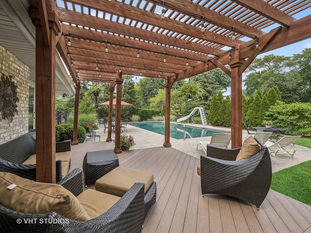 deck with an outdoor pool and an outdoor hangout area