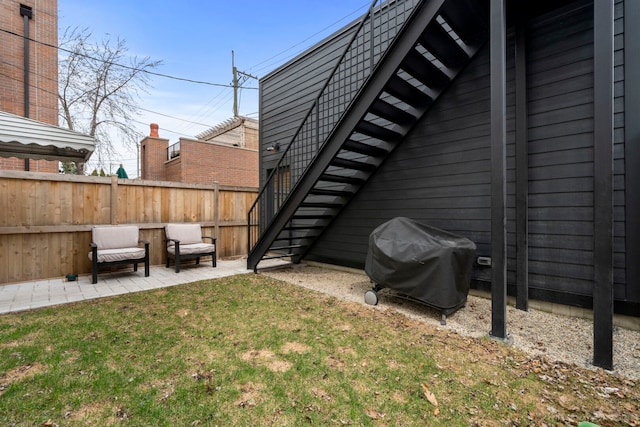 3615 N Janssen Ave, Chicago, IL 60613 - view of yard with fence, stairway, and a patio area