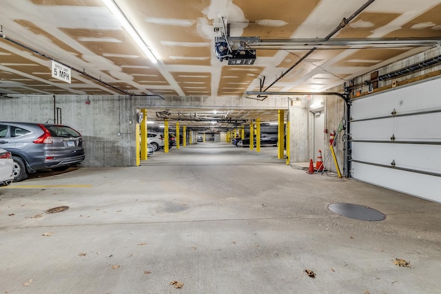 garage featuring a garage door opener