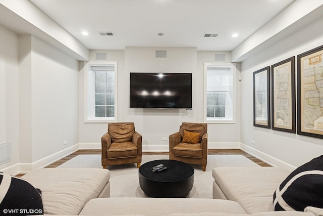 238 S Madison St, Hinsdale, IL 60521 - living area featuring a healthy amount of sunlight, visible vents, baseboards, and wood finished floors