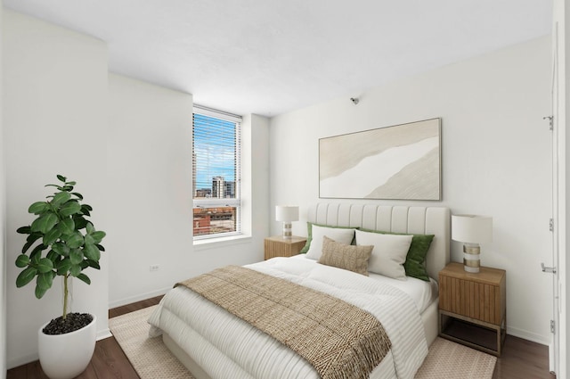 600 N Kingsbury St Unit 1114, Chicago, IL 60654 - bedroom featuring baseboards and wood finished floors