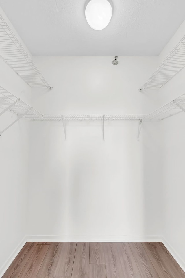 600 N Kingsbury St Unit 1114, Chicago, IL 60654 - spacious closet featuring wood finished floors