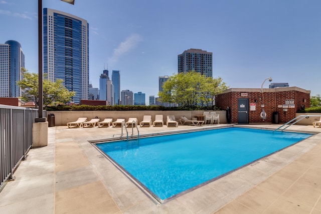600 N Kingsbury St Unit 1114, Chicago, IL 60654 - pool with a view of city, a patio area, and fence