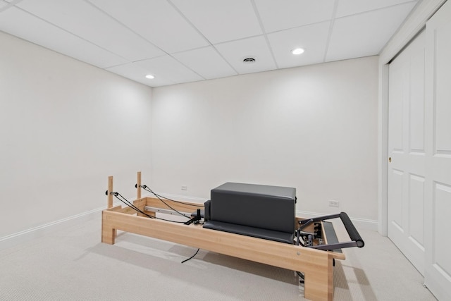 workout area with visible vents, baseboards, a paneled ceiling, carpet floors, and recessed lighting