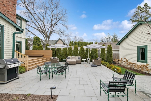 view of patio / terrace featuring area for grilling, an outdoor hangout area, and fence