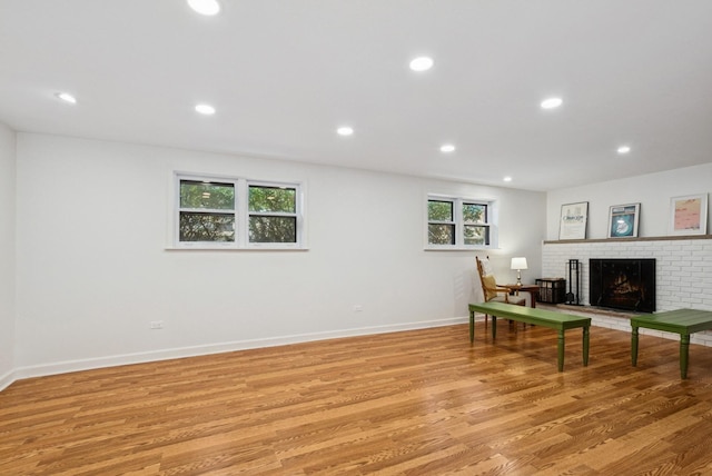 7925 Glen Ln, Darien, IL 60561 - sitting room with light wood finished floors, a fireplace, baseboards, and recessed lighting