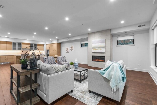 1560 Oakwood Ave Unit 205, Highland Park, IL 60035 - living room featuring dark wood-type flooring, a tile fireplace, visible vents, and recessed lighting