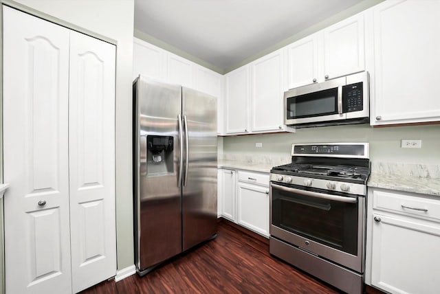2409 Golf Ridge Cir, Naperville, IL 60563 - kitchen with stainless steel appliances, white cabinets, and dark wood finished floors
