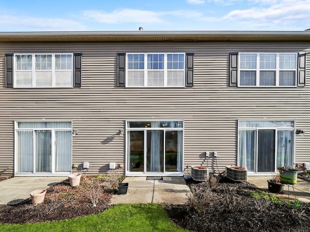 2409 Golf Ridge Cir, Naperville, IL 60563 - back of house with central AC and a patio