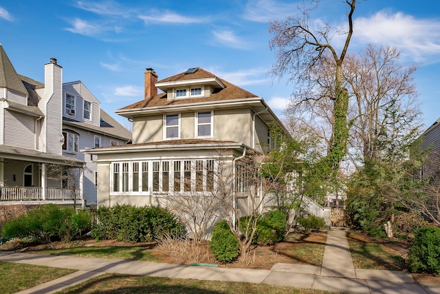 620 S Scoville Ave, Oak Park, IL 60304 - american foursquare style home featuring stucco siding and a chimney