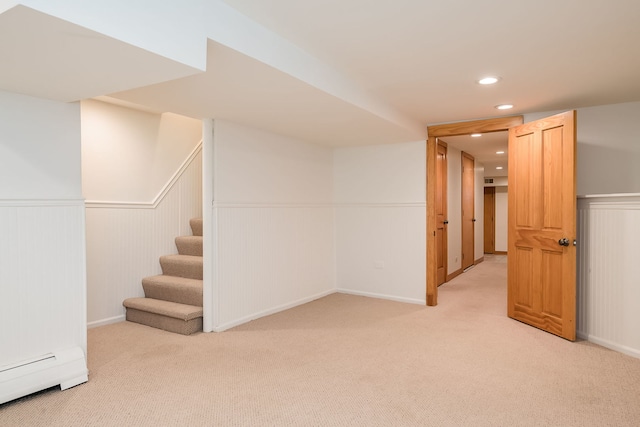 620 S Scoville Ave, Oak Park, IL 60304 - finished below grade area featuring baseboard heating, stairway, a wainscoted wall, light colored carpet, and recessed lighting