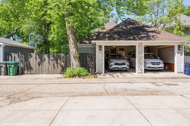 620 S Scoville Ave, Oak Park, IL 60304 - garage with fence, driveway, and a gate