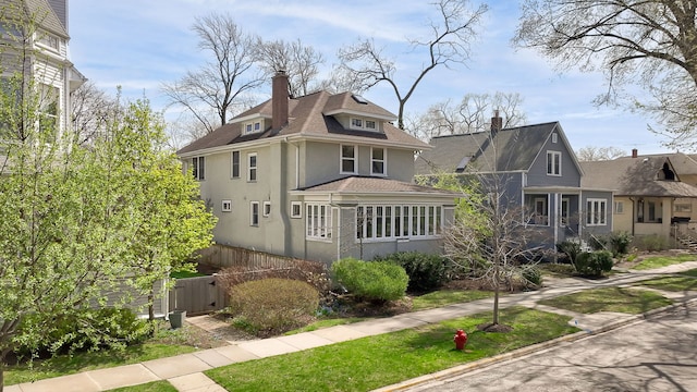 620 S Scoville Ave, Oak Park, IL 60304 - exterior space featuring roof with shingles, a chimney, stucco siding, and fence