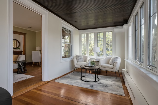 620 S Scoville Ave, Oak Park, IL 60304 - sunroom / solarium featuring hardwood / wood-style floors, baseboard heating, baseboards, and crown molding