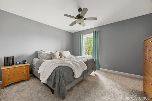 2690 Moss Ln, Aurora, IL 60504 - bedroom featuring light colored carpet, baseboards, and ceiling fan