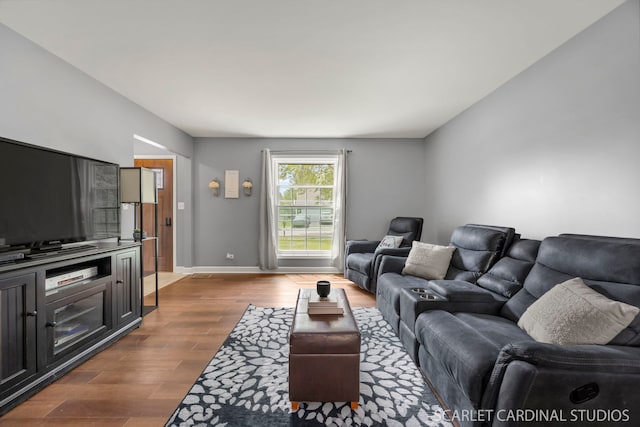 2690 Moss Ln, Aurora, IL 60504 - living area with dark wood-style flooring and baseboards