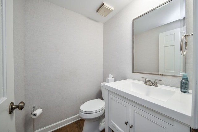 1007 Canonero Dr, Naperville, IL 60540 - half bath with toilet, wood finished floors, and vanity